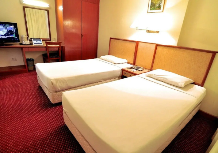 ZEN Rooms First Business Inn
