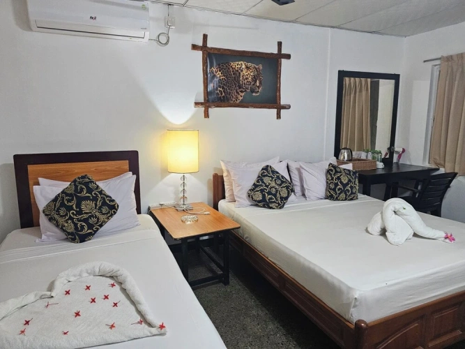 Superior Triple room with garden view
