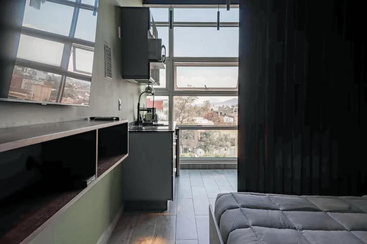 The Jungle Loft Tropical Comfort in a Centric Location With Kitchen