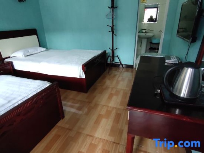 Standard Quadruple room with garden view