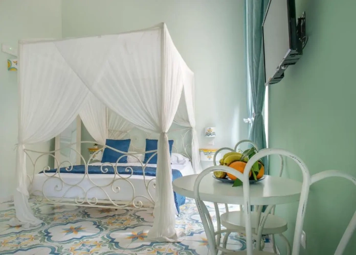 Deluxe Quadruple room with balcony and with sea view