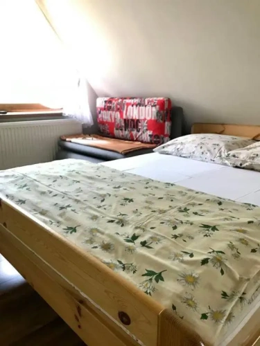 Standard Triple room with garden view