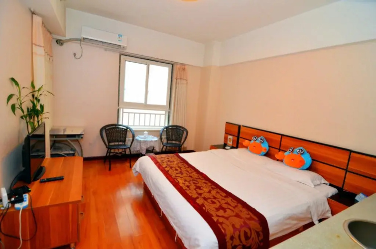 E Home Aparthotel