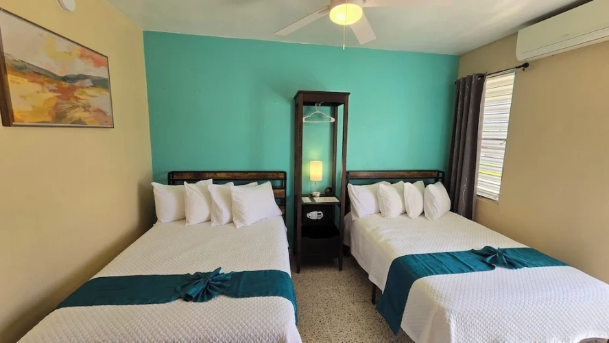 Deluxe Quadruple room with balcony