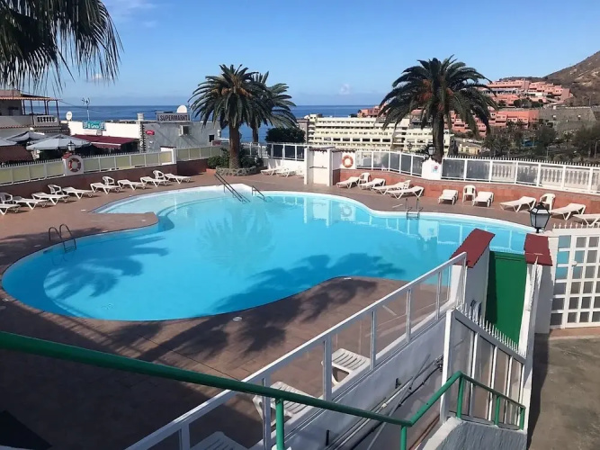 Sunset Balcony With Ocean Views and Pool Access