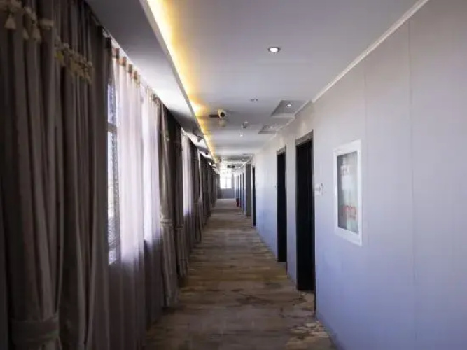 Xiongxian Qiancun Business Hotel