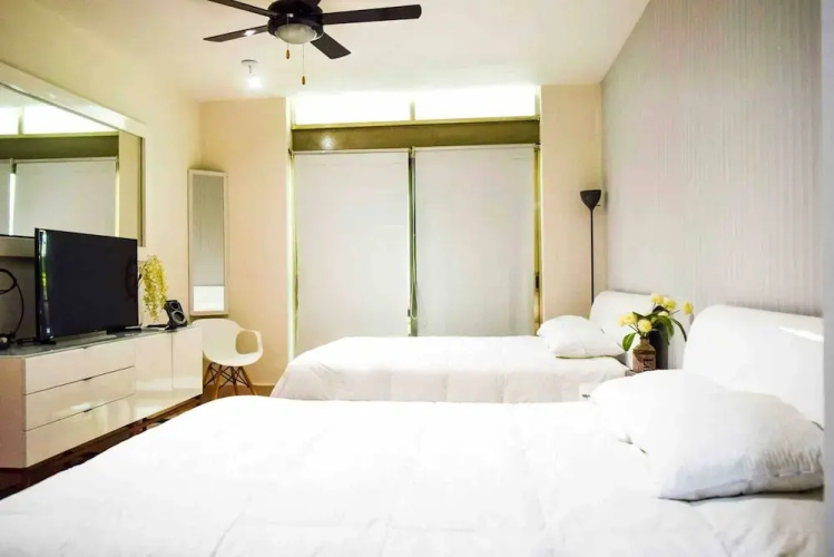 LUXURY CONDO STEPS FROM 5th AV & BEACH