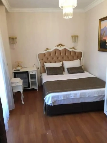 Deluxe Triple room with balcony and with city view