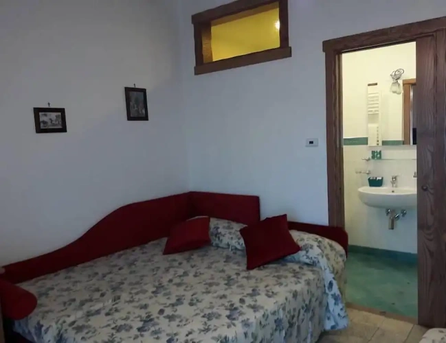 Standard Quadruple room with garden view