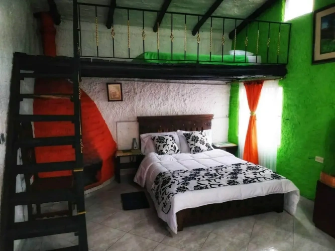 Standard Triple room with garden view