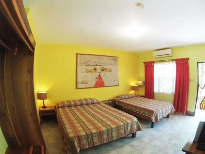 Standard Triple room with balcony and with garden view