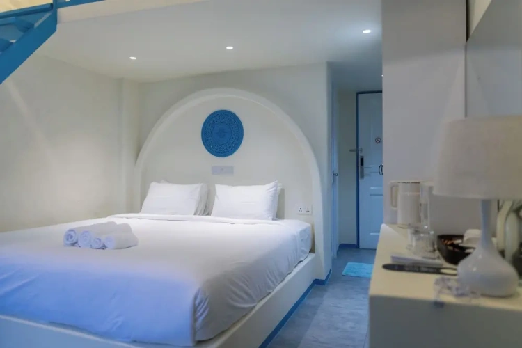 Standard Quadruple room with balcony and with city view