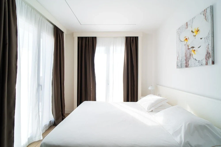 Deluxe Quadruple room with balcony and with sea view