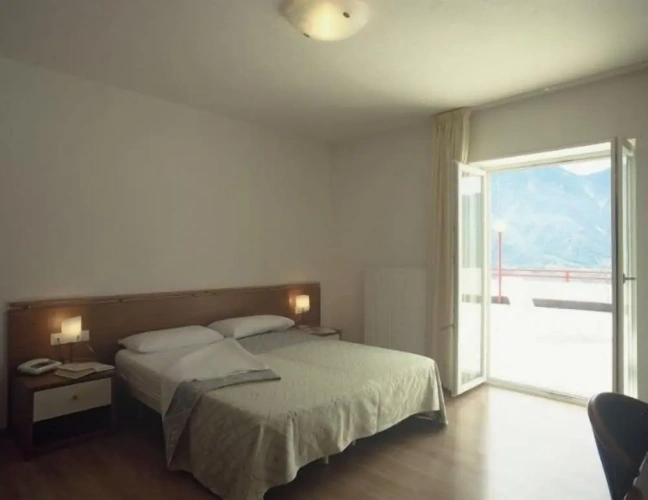 Standard Quadruple room with balcony and with mountain view