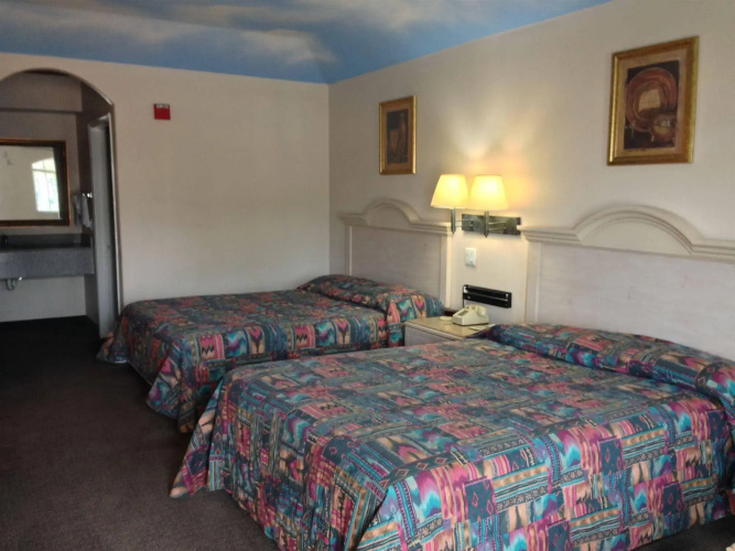 Camelot Inn  Suites McCarty