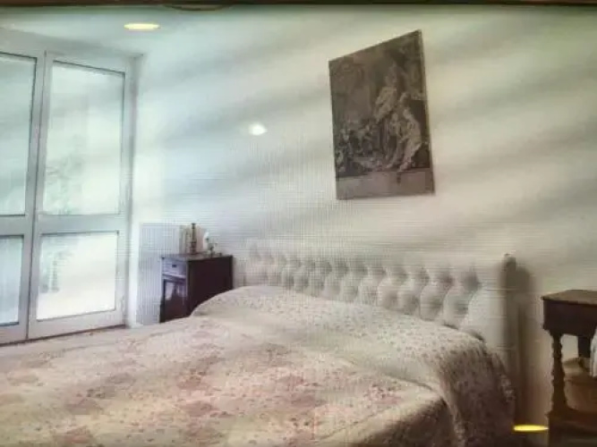 Casa con giardino