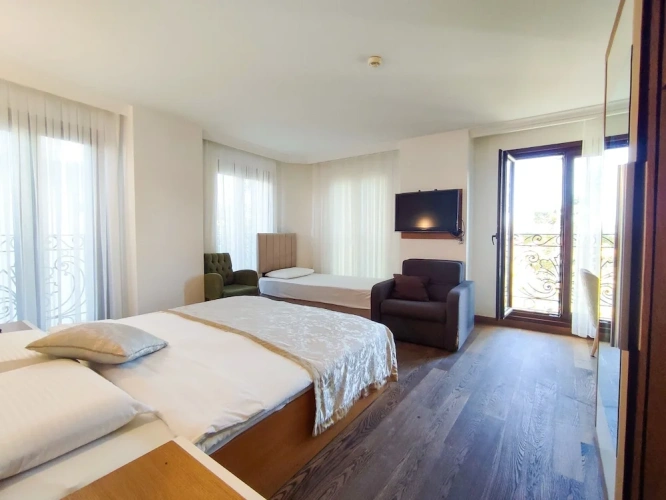 Standard Triple Family room with partial sea view