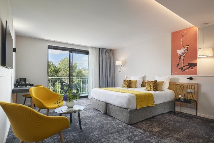 Deluxe Quadruple room with balcony