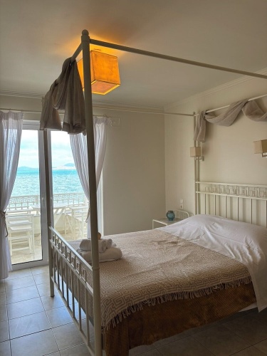 Deluxe Quadruple room with balcony and with sea view