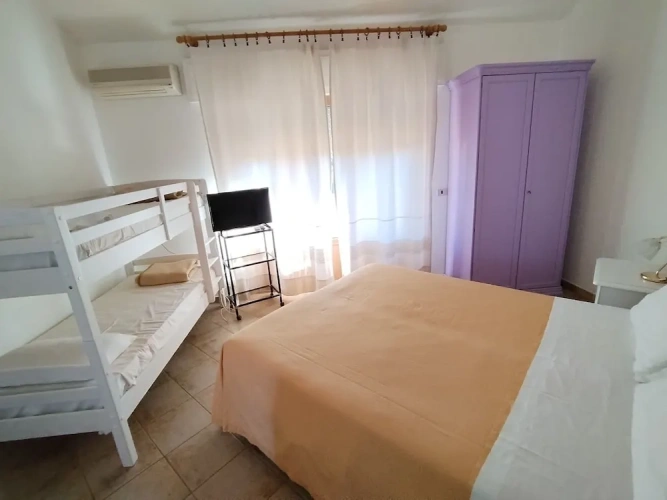 Standard Quadruple Family room with balcony and with garden view