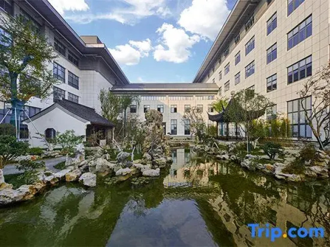 Maison New Century Hotel
