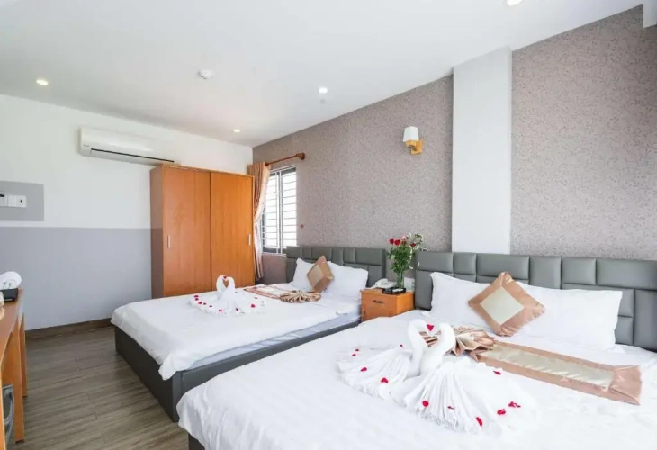 Standard Triple room with balcony and with city view