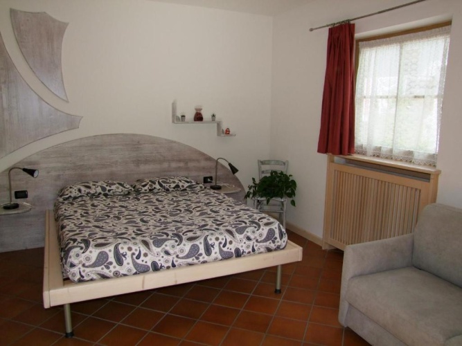 Standard Quadruple room with garden view