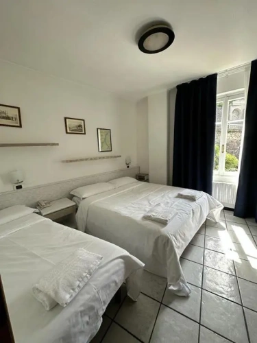 Standard Triple room with garden view