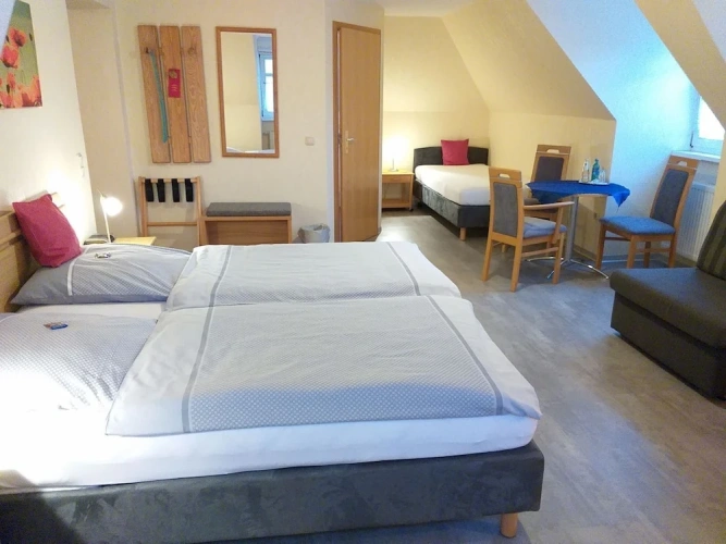 Standard Triple room with garden view