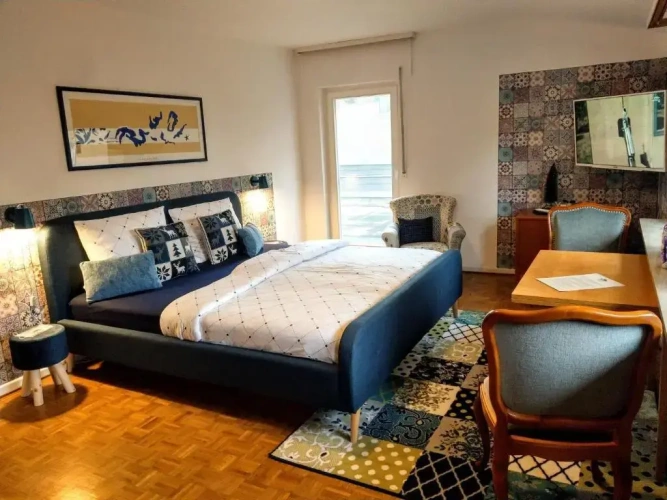 Standard Triple room with garden view