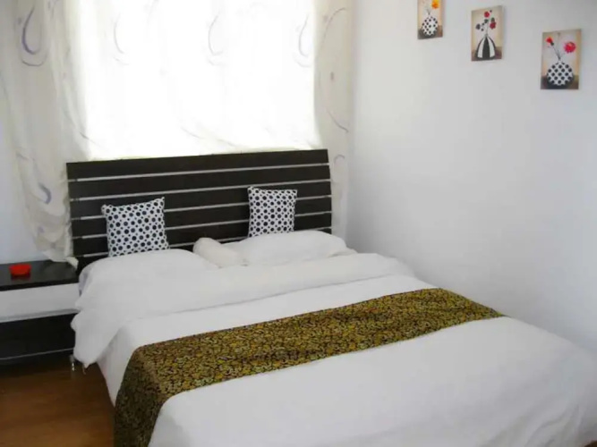 Dalian Yijia Apartment
