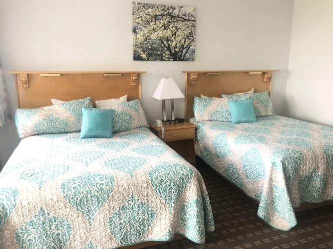 Deluxe Quadruple room with balcony and with ocean view