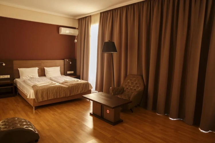 Olympus Hotel By Umbrella