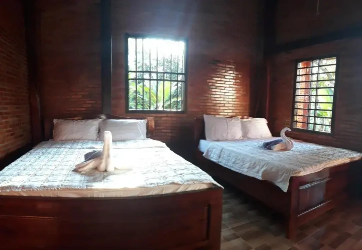 Standard Quadruple room with garden view