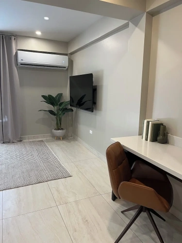 Deluxe Quadruple Suite with pool view