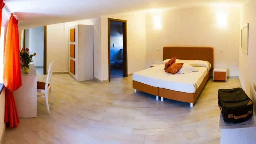 Standard Triple room with garden view