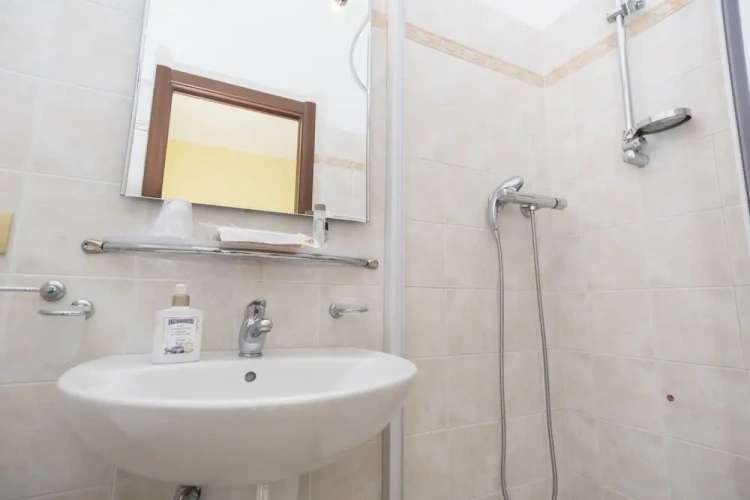 Standard Triple room with balcony and with garden view