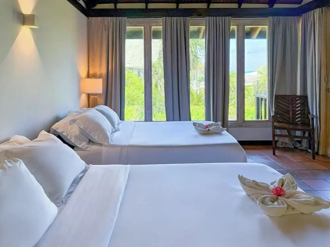 Standard Quadruple room with balcony and with garden view
