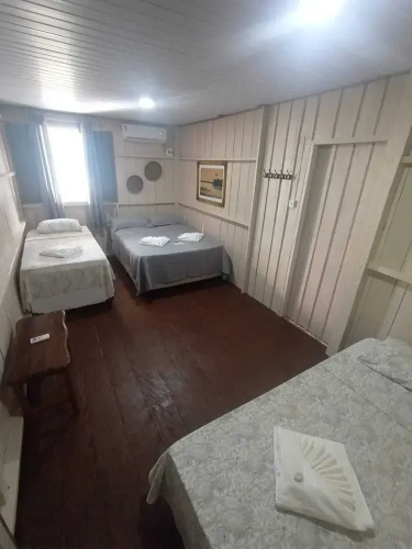 Standard Quadruple room with garden view