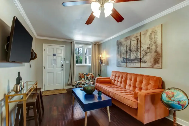 Vibrant, Colorful Condo Building With Backyard Firepit and Games