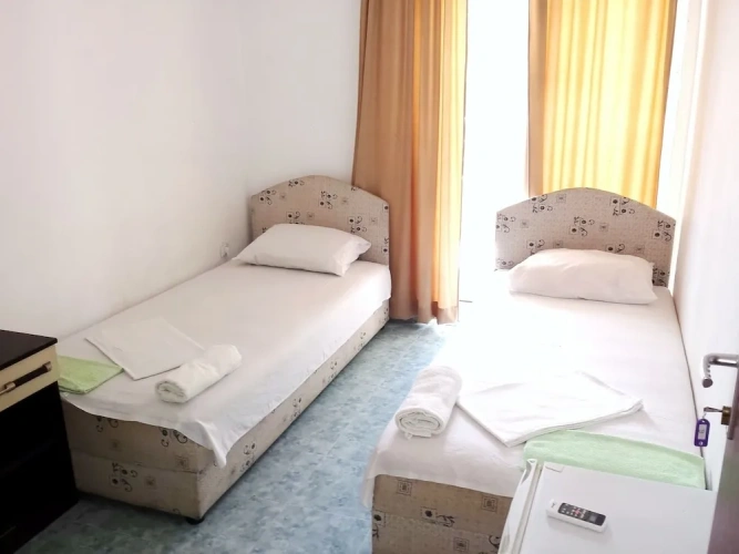 Standard Quadruple room with partial sea view
