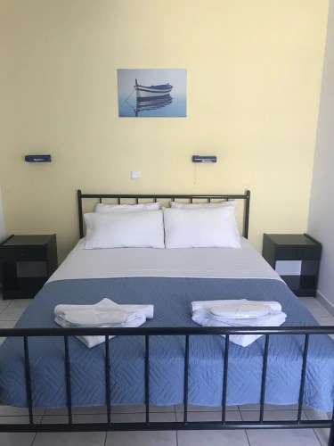 Standard Triple room with balcony and with garden view