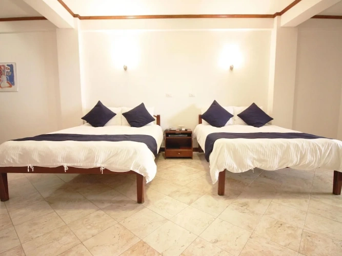 Quadruple Suite with balcony and with pool view