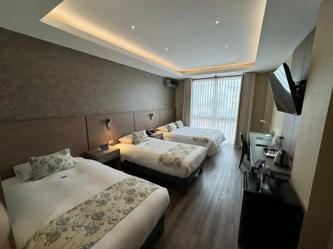 Standard Triple Family room with balcony and with city view