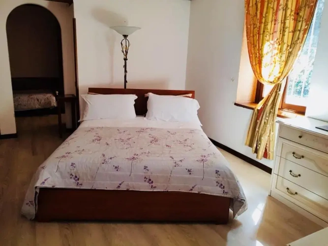 Standard Triple room with garden view