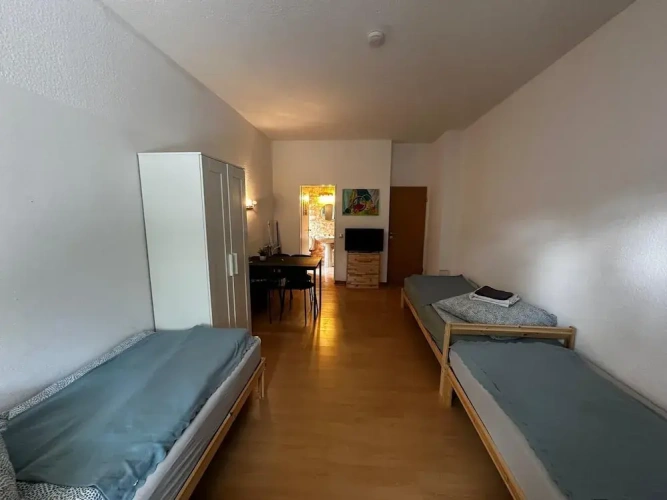 Standard Triple room with garden view