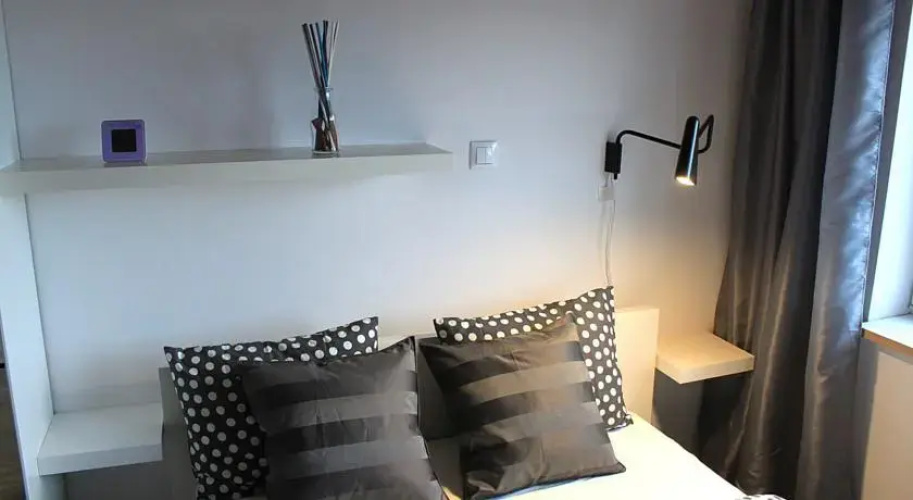 Yellow Peaked Shoe Apartment