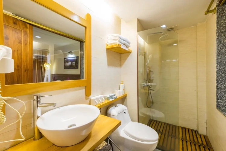 Standard Triple room with garden view