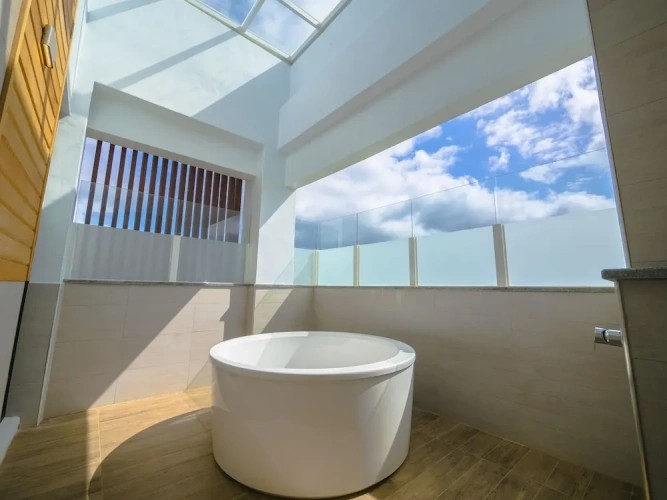 Deluxe Quadruple room with balcony