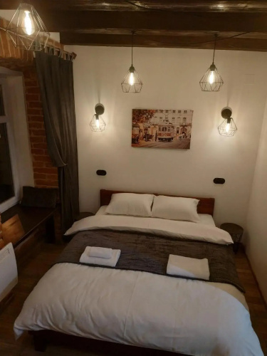Loft апартаменти з балконом в центрі Львова